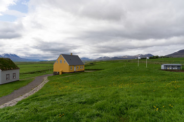 Fototapeta na wymiar Traditional icelandic wooden yellow House in Iceland