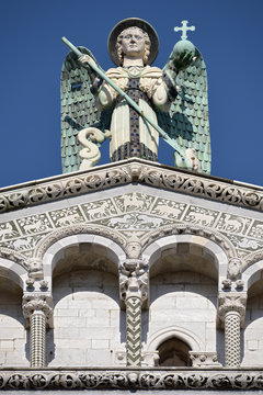San Michele in Foro is a Roman Catholic basilica church in Lucca. On the summit, flanked by two other angels,