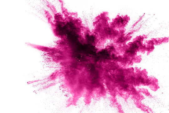 Pink powder explosion isolated on white background.