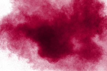 Fototapeta premium red powder explosion isolated on white background.