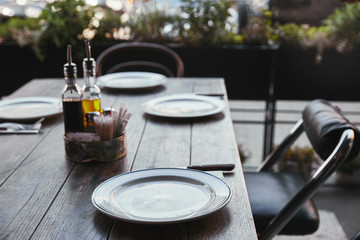 close-up shot of simple table setting with spices at restaurant