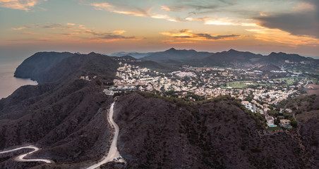 Fototapeta premium Panoramic landscape sunset view of Atamaria, Spanish village. Cartagena, Murcia, Spain, Summer 2018 from drone