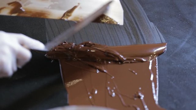 Tempering chocolate temperature for using a marble working surface.