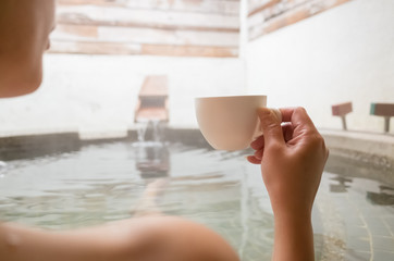 woman hold a cup of coffee