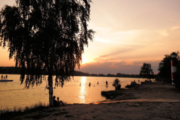 beautiful sunset after wonderful summerday at the lakeside