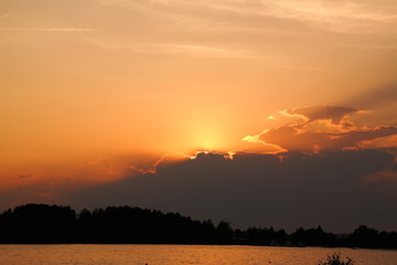 beautiful sunset after wonderful summerday at the lakeside