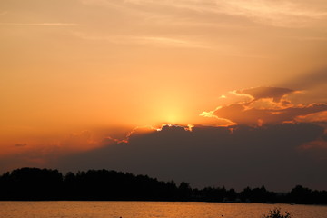 beautiful sunset after wonderful summerday at the lakeside