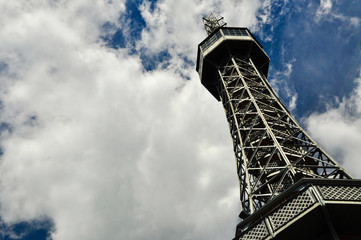 Lookout tower with blue sky and clouds in the background