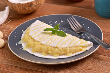 Tapioca filled with coconut brigadeiro and condensed milk