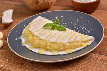 Tapioca filled with coconut brigadeiro and condensed milk