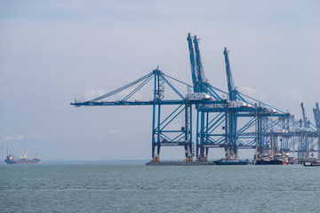 Fototapeta premium View of Northport of Port Klang, Malaysia. One of the largest multi-purpose ports of its kind in the national ports system offering dedicated facilities and services to handle wide variety of cargoes.