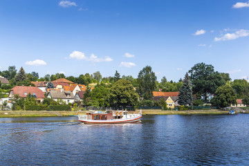 Fototapeta na wymiar Tourist ship on the Vltava river