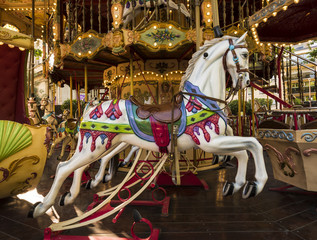 Colorful horse in a carousel in Avignon. Vaucluse, Provence, France, Europe.