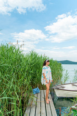 Paya | Pareos with boats in reeds | Balaton