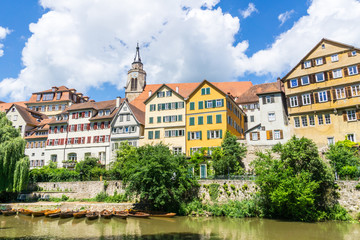 Germany, Colourful old town of Tuebingen behind many punt boats