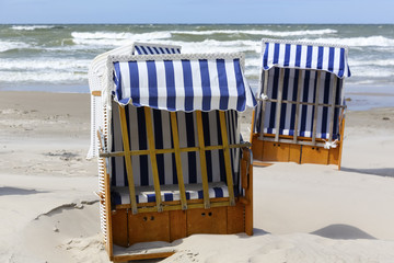 Beach chairs with small roofs