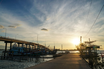 Fototapeta premium fishing boats at the port, bridge, thailand 