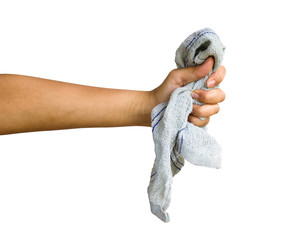 Cropped hand of person holding rag or table wipes against white background included clipping path.