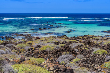 Rocky beach in Caletón Blanco in Lanzarote, Spain