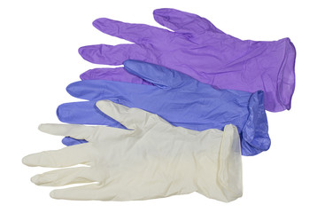 Colored medical latex gloves on white background