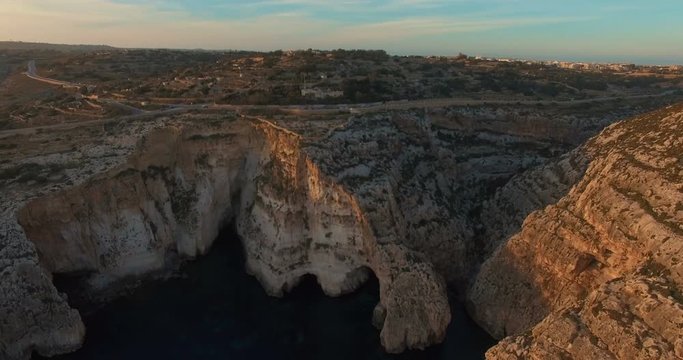 Aerial shot - Flying over Cliffs during Sunset