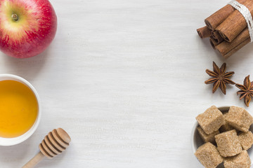 Honey and Apple, brown sugar and anise with cinnamon on a light background copy space for text.