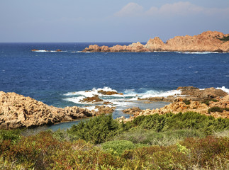 Fototapeta na wymiar Mediterranean sea in Isola Rossa village. Sardinia. Italy