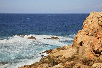 Mediterranean sea in Isola Rossa village. Sardinia. Italy