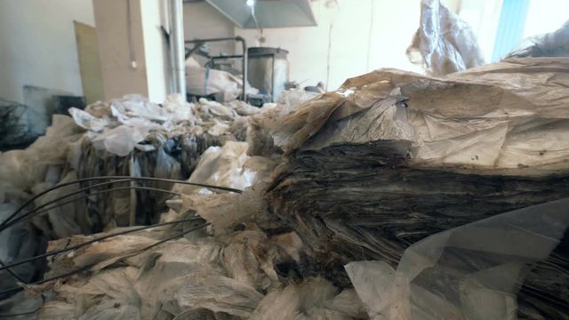 Plenty of plastic packaging material piled up in a recycling unit