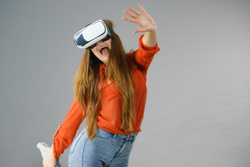 Girl wearing virtual reality goggles.
