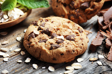 Chocolate cookies on rustic table. Chocolate chip cookies and cookies with oat flakes or oatmeal.