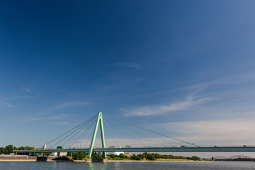 The Severinsbruecke (Severins Bridge) over the Rhine River in Cologne (Koeln), Germany, on a sunny Day