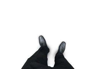 Isolated businessman in black shoes standing on white floor - 217190654