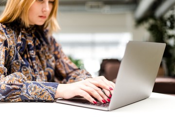 Business woman working on a laptop