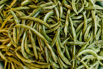 Agriculture. Agroindustrial industry. Healthy lifestyle. Raw food. Vegetable market. Lawn grass. Green background. Gifts of the Earth. Indian vegetables. The Bazaar of Asia.