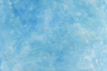 Blurred blue pastel color wall vignette texture abstract background.