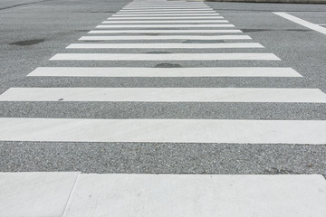 Zebra crosswalk on the road for safety when people walking cross the street, Pedestrian crossing, asphalt road, White lines and crosswalk on street background  