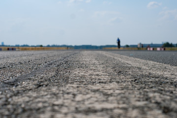 empty asphalt road closeup - runway macro