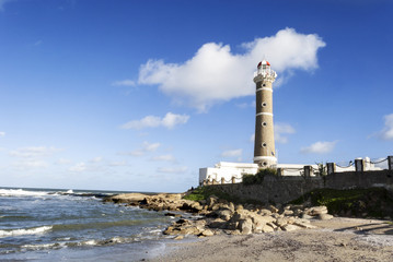 Sunny day and view to the famous lighthouse on Jose Ignacio beach, Punta del Este, Uruguay.