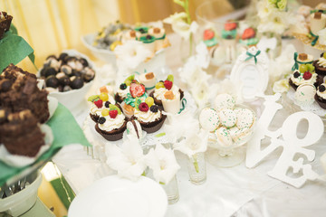 Different kinds of baked sweets on a buffet