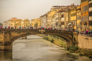 Rainy day bridge crossing in Florence Italy