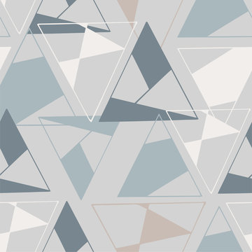 Seamless geometric pattern repeat of Triangles in various pastel colours on a grey background. Surface Pattern Design. Great for fabric, scrapbooking, paper products and more!
