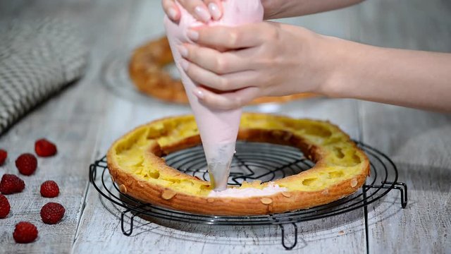 Preparation homemade choux pastry cake Paris Brest. French dessert.