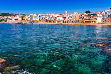 Sea landscape with Calella de Palafrugell, Catalonia, Spain near of Barcelona. Scenic fisherman village with nice sand beach and clear blue water in nice bay. Famous tourist destination in Costa Brava