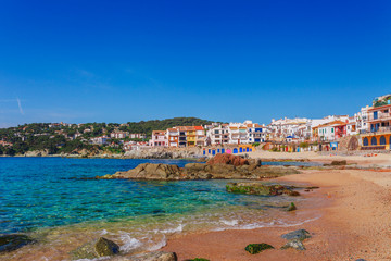 Sea landscape with Calella de Palafrugell, Catalonia, Spain near of Barcelona. Scenic fisherman village with nice sand beach and clear blue water in nice bay. Famous tourist destination in Costa Brava