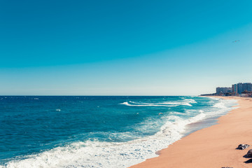 Sea landscape in Blanes, Catalonia, Spain near of Barcelona. Scenic town with nice sand beach and clear blue water in beautiful bay. Famous tourist resort destination in Costa Brava