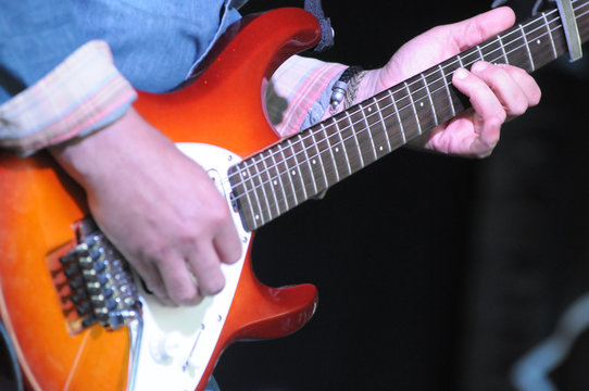 play the guitar