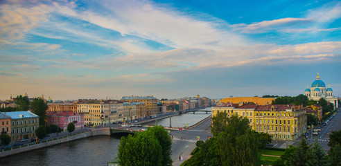 Top view of the house, bridges, Fontanka river, Trinity Cathedral. Evening landscape of the city....