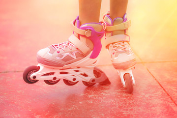 Close up of roller skater girl. Toned image