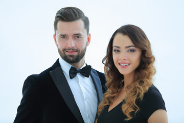 Portrait of a handsome man looking at the camera with a woman